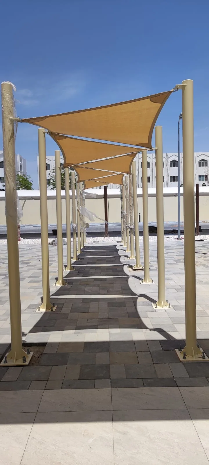 Completed car parking shade structure at ADICC Baniyas in Baniyas, Abu Dhabi — installation view 2