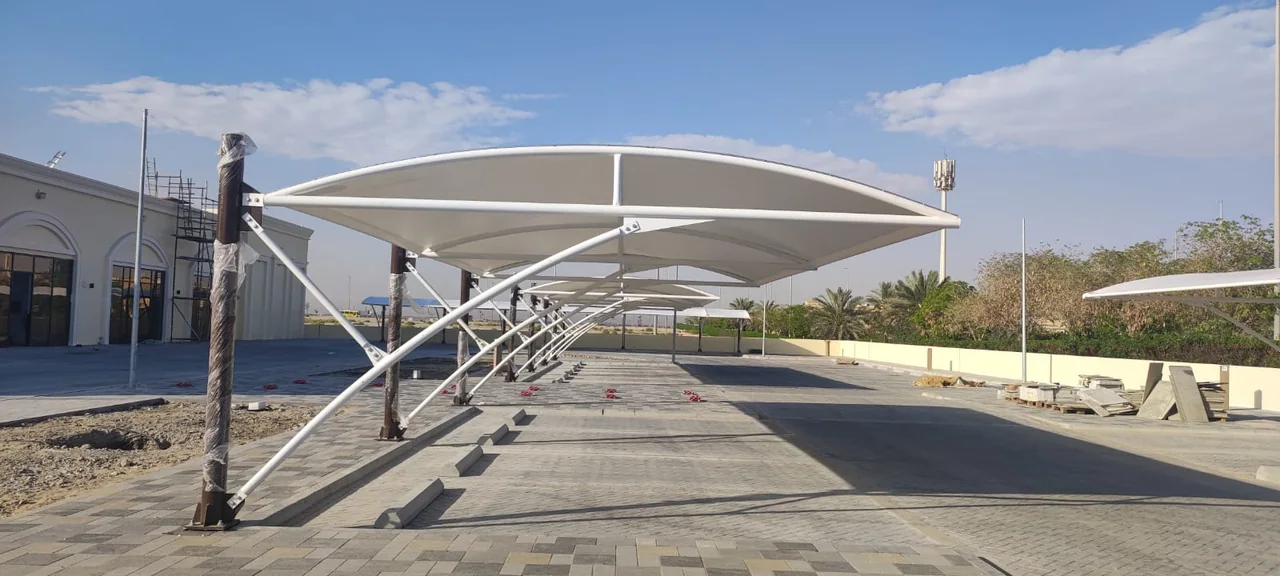 Completed car parking shade structure at ADICC Baniyas in Baniyas, Abu Dhabi — installation view 3
