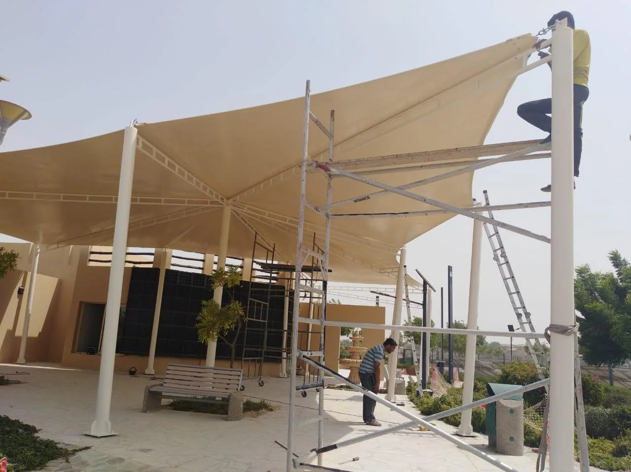 Completed tensile membrane shade structure at Al Khawaneej Park in Dubai — installation view 3