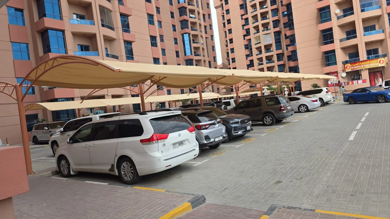 Completed car parking shade structure at Al Nuaimiya Tower in Ajman — installation view 2