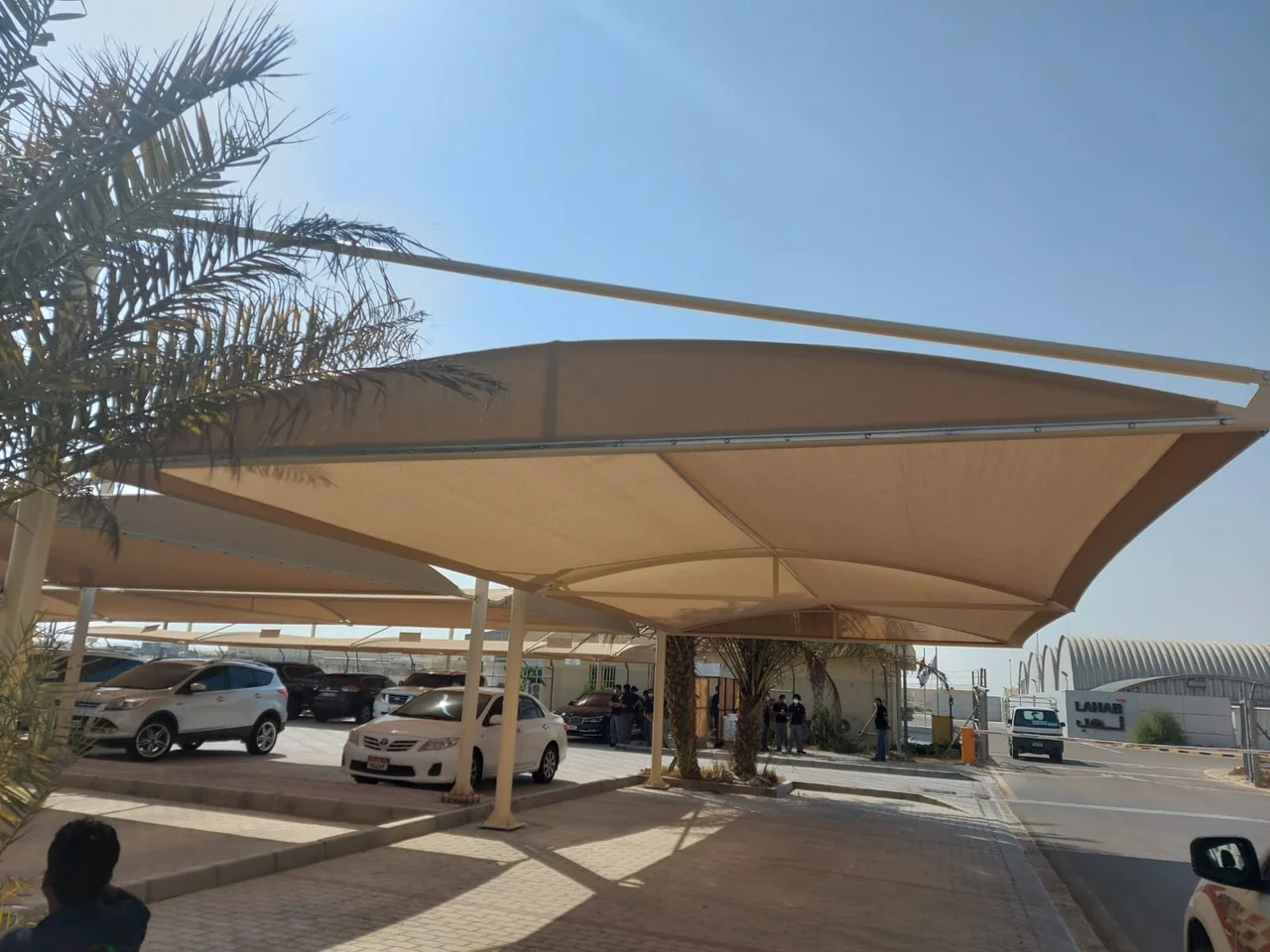 Completed car parking shade structure at Al Tawazan Industrial Area in United Arab Emirates
