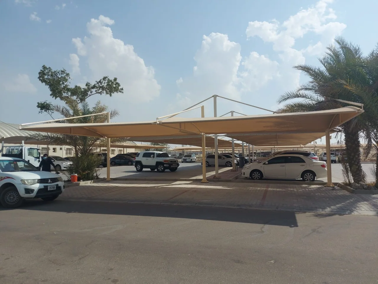 Completed car parking shade structure at Al Tawazan Industrial Area in United Arab Emirates — installation view 2