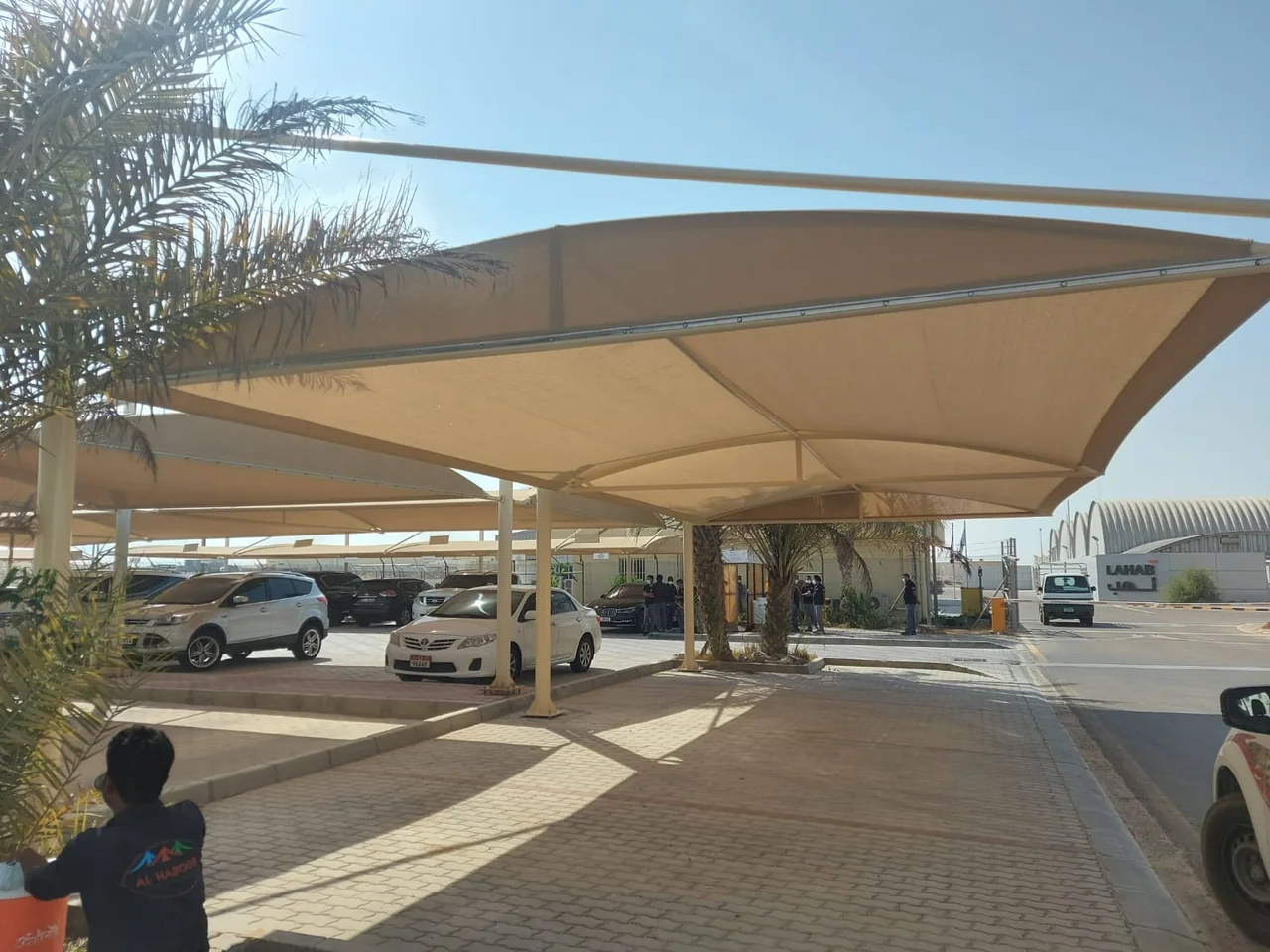 Completed car parking shade structure at Al Tawazan Industrial Area in United Arab Emirates — installation view 3