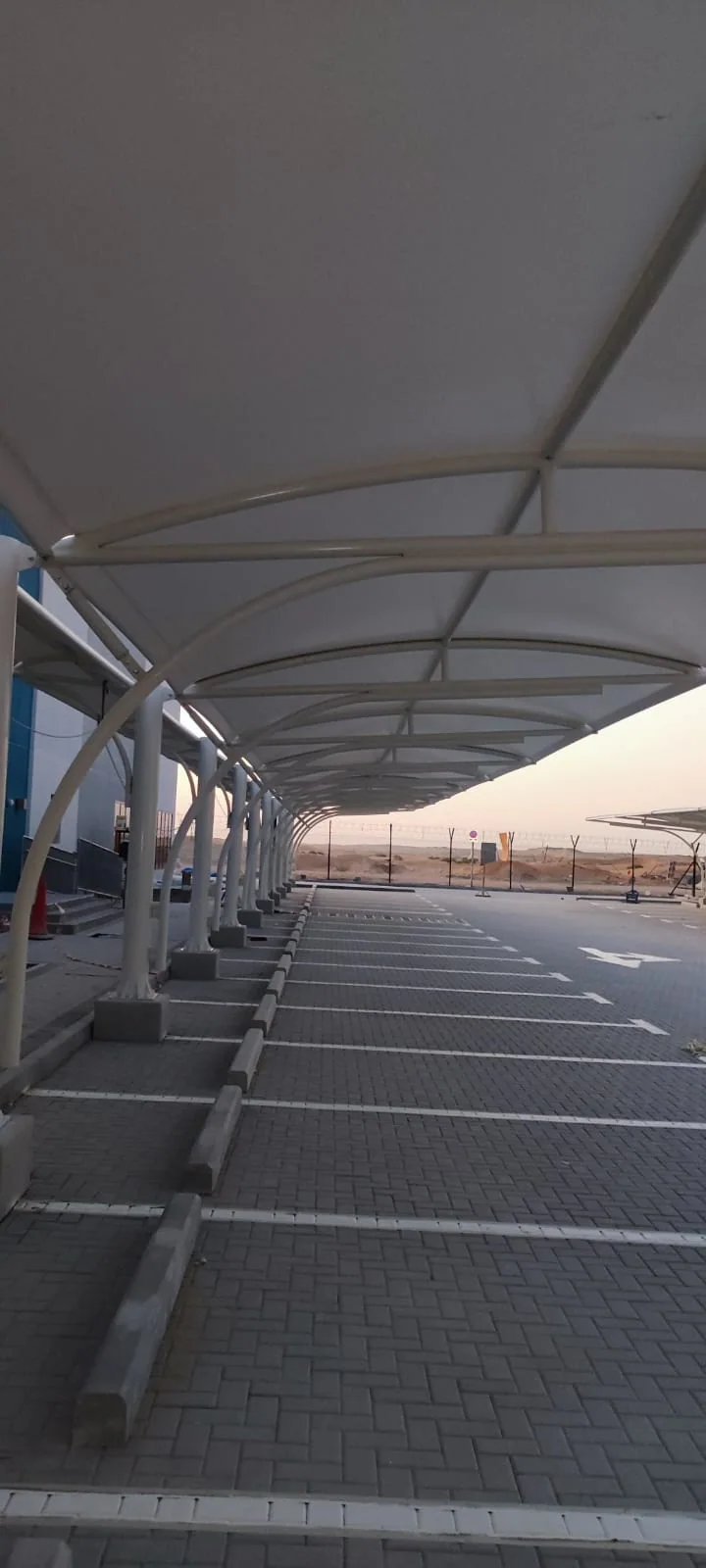 Completed car parking shade structure at Amanah Hameem in Abu Dhabi — installation view 2