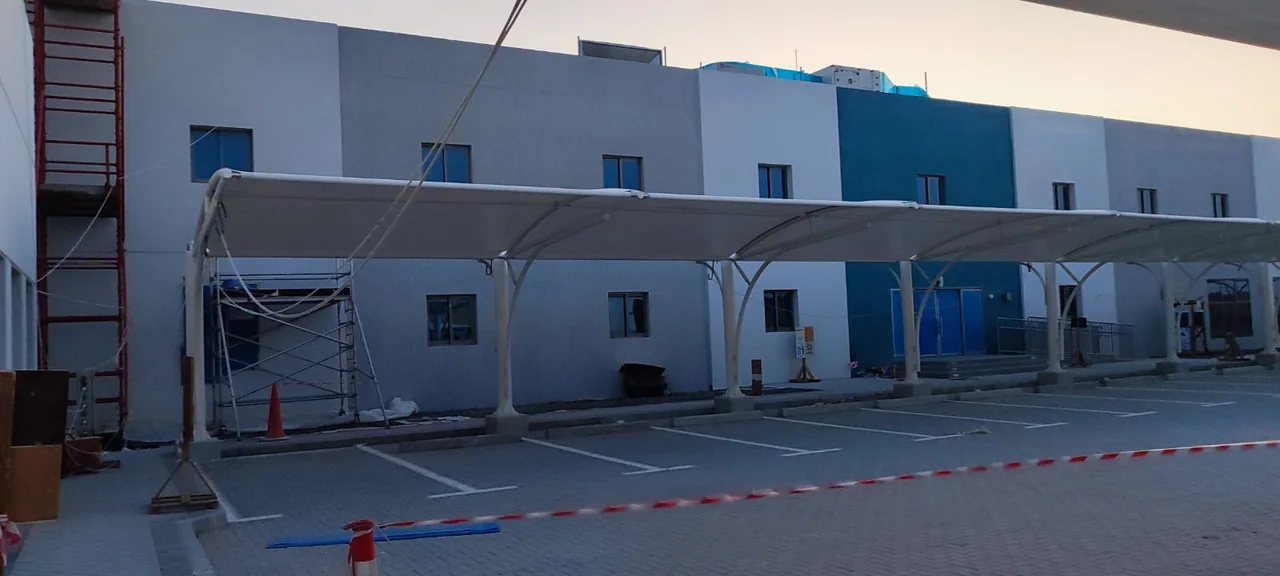 Completed car parking shade structure at Amanah Hameem in Abu Dhabi — installation view 3