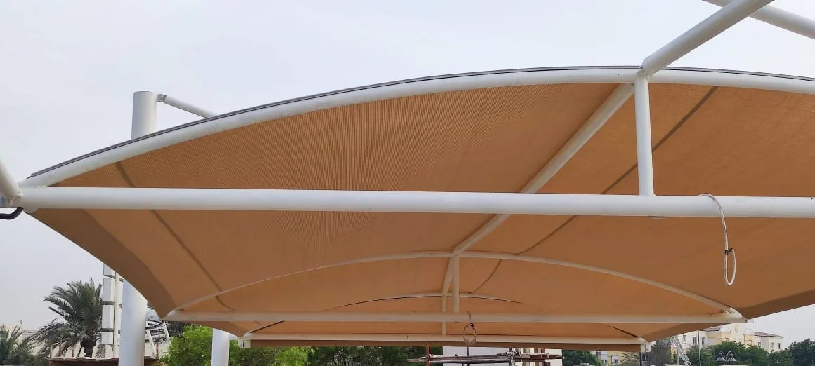 Completed car parking shade structure at Choithrams Green Community in DIP, Dubai — installation view 3
