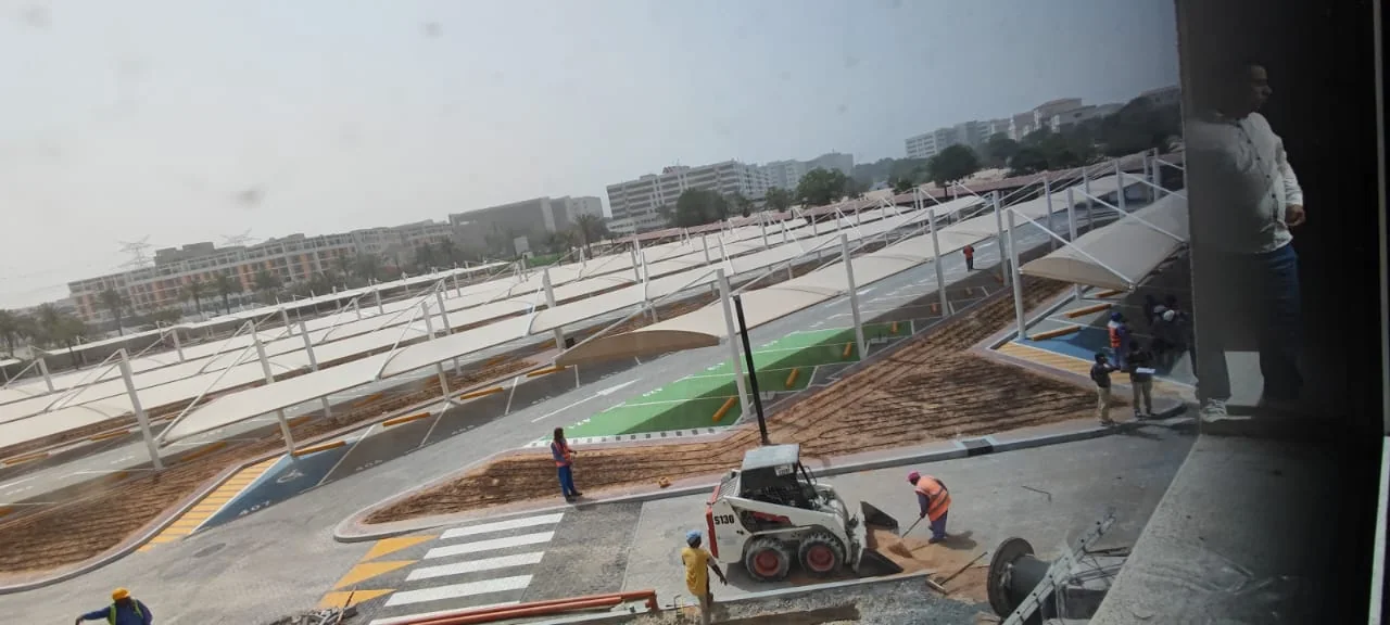 Completed car parking shade structure at Choithrams Green Community in DIP, Dubai — installation view 4