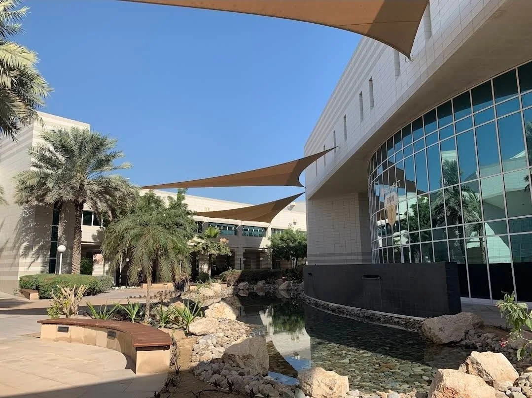 Completed tensile membrane shade structure at HCT Al Nahda in Dubai — installation view 2