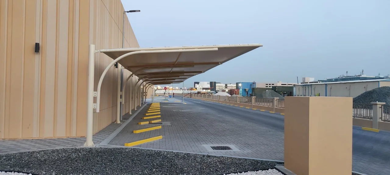 Completed car parking shade structure at Prompt MBZ in MBZ, Abu Dhabi — installation view 4