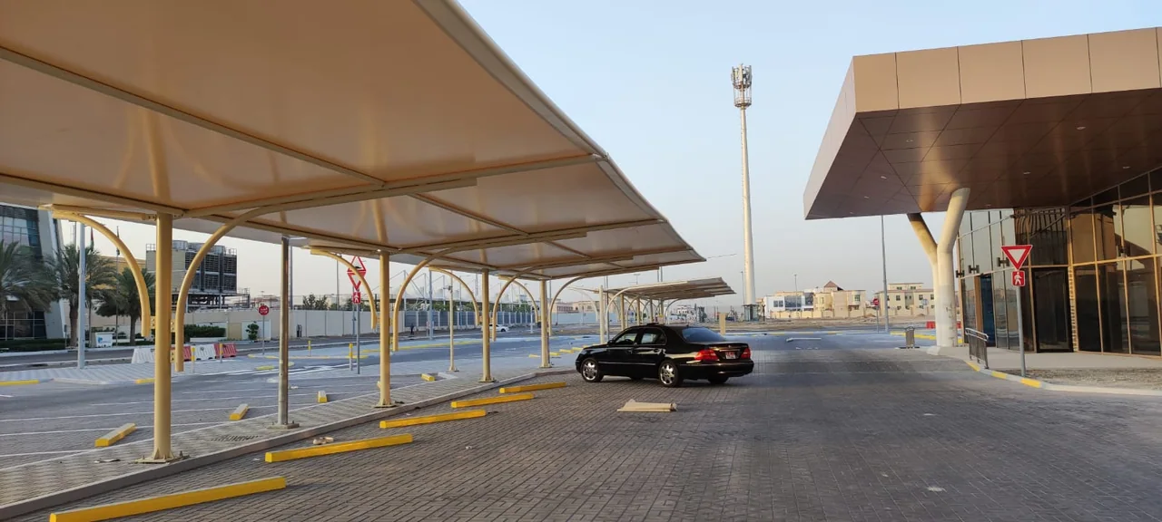 Completed car parking shade structure at Prompt MBZ in MBZ, Abu Dhabi — installation view 5